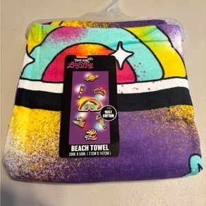 Colorful Beach Towel with Rainbow Design.